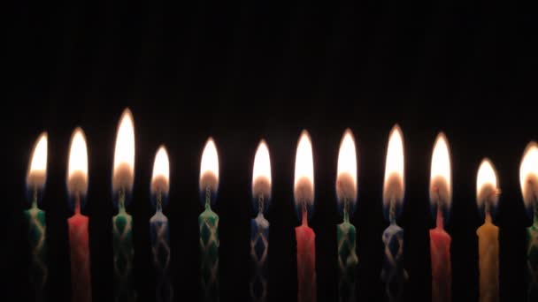 Birthday candles on black — Stock Video