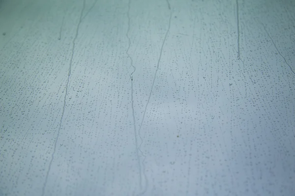 Su damlası yağmur, arka plan için sonra kule penceresinde sanat desen.