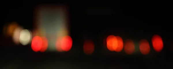 Homályos Piros Teherautó Lámpák Sötét Elvont Forgalom Éjszakai Úton — Stock Fotó
