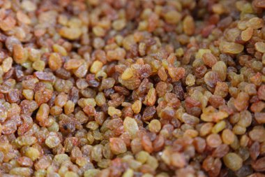 Yemek pişirmek için bir sürü kuru üzüm malzemesi, doğal kuru meyve arkaplan dokusu.
