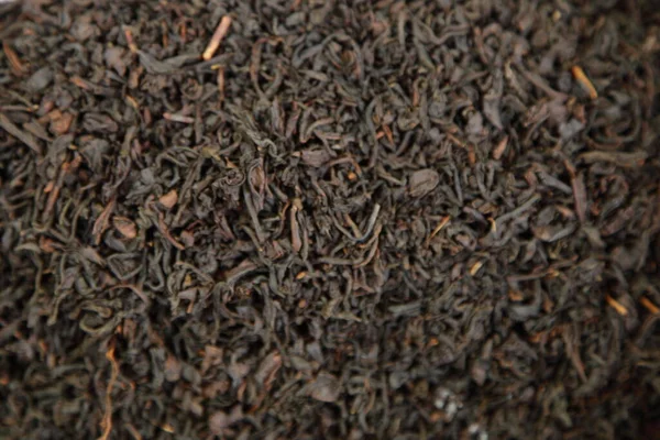 Dried black tea mix background texture, natural ingredient for food cooking