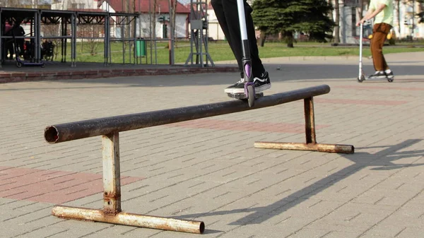 Rider Guy Trick Kick Scooter Slides Metal Tube Ramp Closeup — Stock Photo, Image