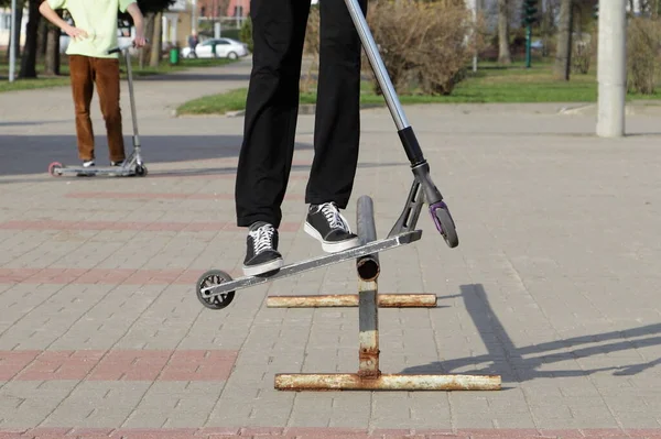 Rider Boy Trick Kick Roller Slides Metal Tube Ramp Close — Fotografia de Stock