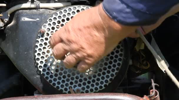 European Farmer Hands Start Broken Walk Tractor Motor Hood Cap — Stock Video