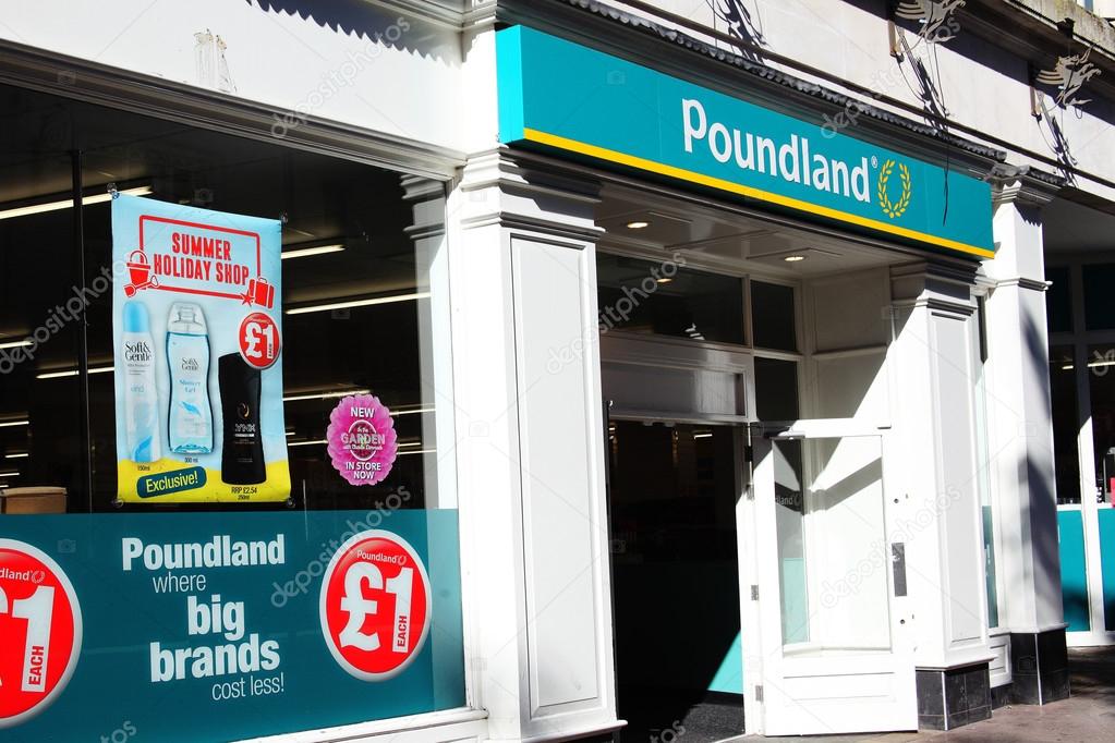 Cardiff, Wales, UK , August 31, 2016 : Poundland advertising sign outside the entrance to their retail store in Queen Street