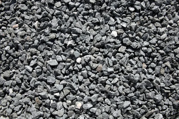 グレー ブラック粉砕岩小石石の背景 — ストック写真