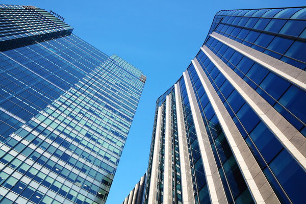Futuristic glass and steel skyscraper office block towers