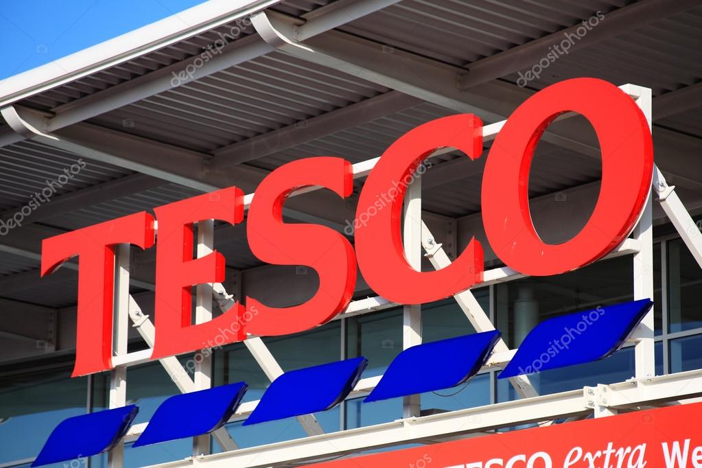 London, UK, November 19, 2011:  Tesco logo advertising sign outside its retail supermarket stores in Brent Park Wembley