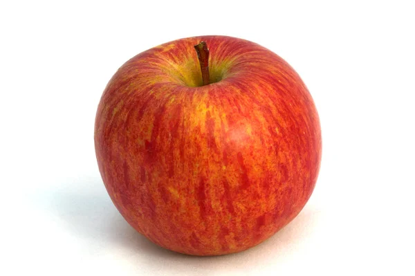 Красное яблоко на белом фоне — стоковое фото
