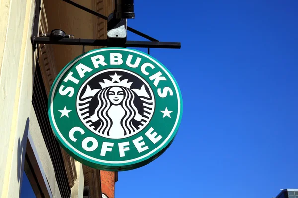 Insegna pubblicitaria logo verde Starbucks — Foto Stock