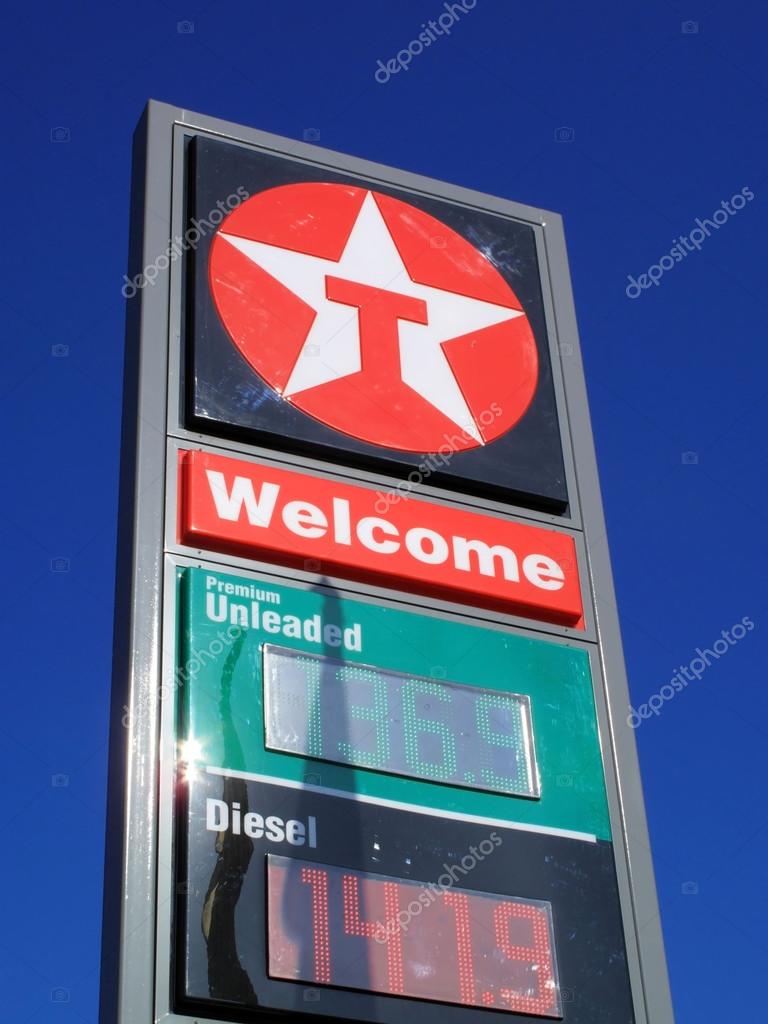 London, UK, June 2, 2011 : A  Texaco petrol station sign on the Western Avenue showing its company logo and prices