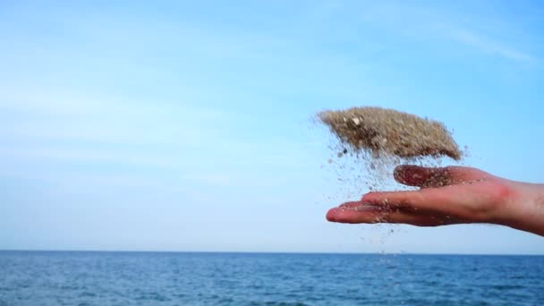 Man Throw Sand Background Sky Sea Slow Motion — Stock Video