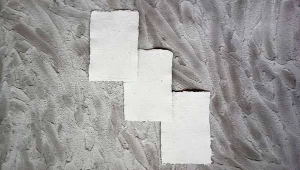 Geri dönüştürülmüş malzemelerden yapılan el yapımı geri dönüşümlü kağıt. Çevre dostu, harmanlanmış dokular, beton bir arka planda. Model oluşturmak için ideal.
