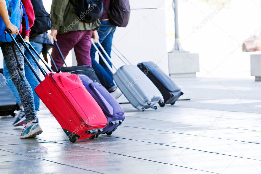 rush, luggage at the airport, travel to coronavirus,