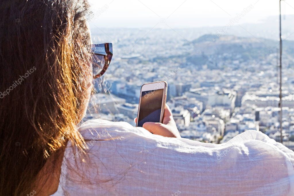 girl with a back phone