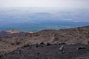 Beautiful landscape of Sicily with the active volcano Etna during the day. Traveling in Italy