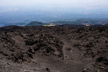 Beautiful scenery of Sicily and a road with the active volcano Etna during the day. Traveling in Italy