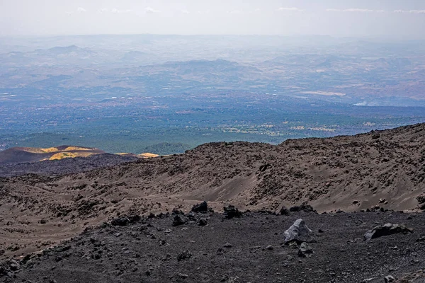 Beautiful landscape of Sicily with the active volcano Etna during the day. Traveling in Italy
