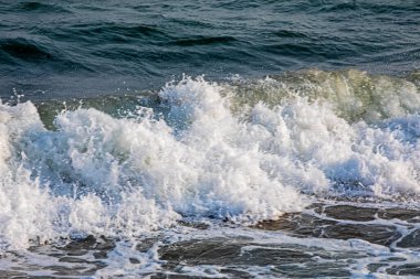 Big waves at sea. Tsunami. Storm disasters.