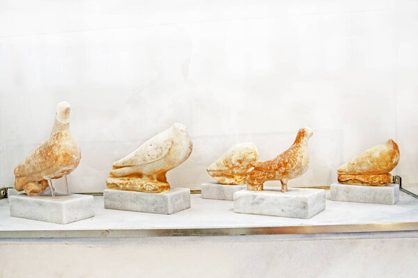 Decorative antique marble figures of birds and doves