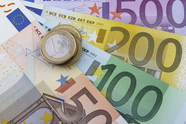 Monete e banconote in euro (EUR) . — Foto Stock