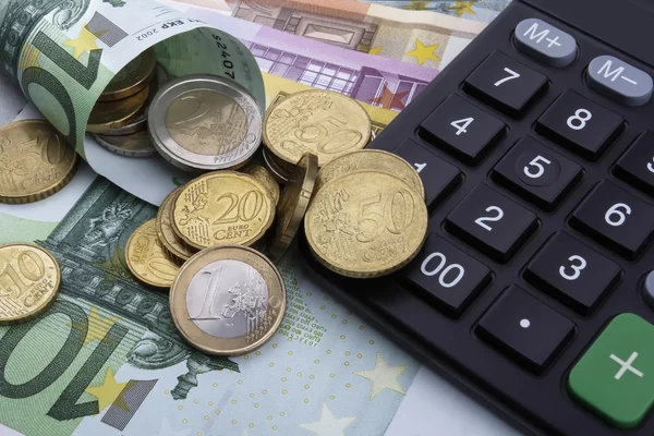 Euro (Eur) en een rekenmachine. Bedrijfsconcept. — Stockfoto