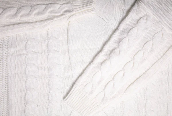 Stickad vit vinter tröja konsistens kan vara bakgrund — Stockfoto
