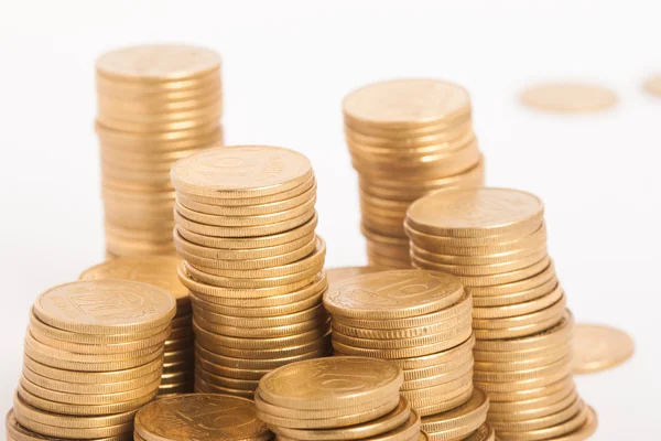 Stacks of coins on white backgrond — Stock Photo, Image