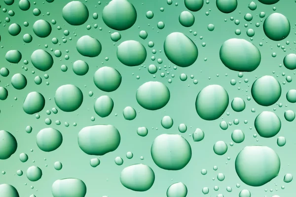 Green water drops — Stock Photo, Image