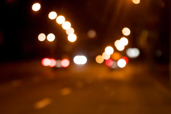 Bulanık gece sokak arka plan ile Böke — Stok fotoğraf