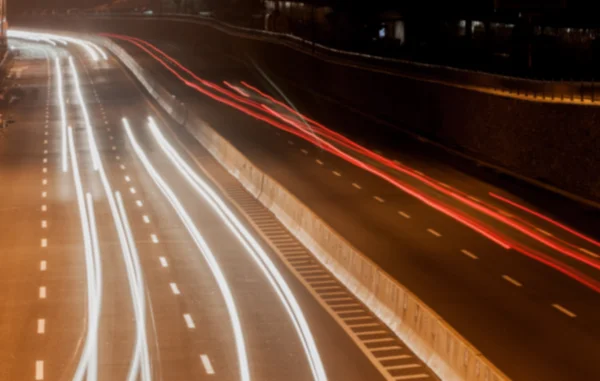 Blurred road at night — Stock Photo, Image