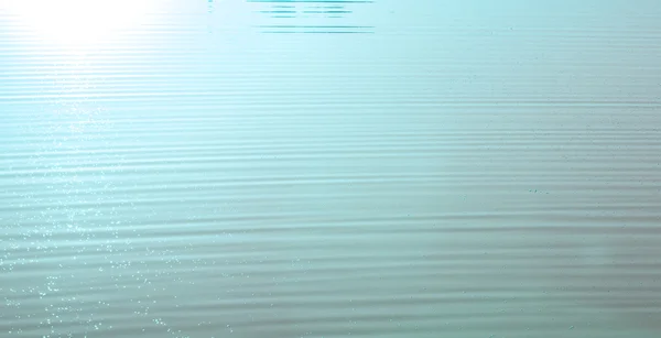 Oleando fondo de superficie de agua — Foto de Stock