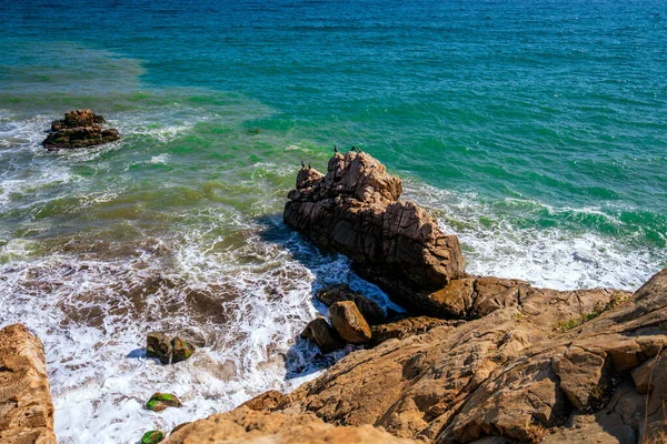 Seascape with rocks and waves from above, Crimea