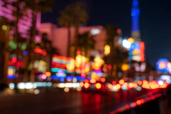 Panorama of the street with hotels in Las Vegas, lots of bright lights from cars and buildings. Las Vegas, USA - 18 Apr 2021