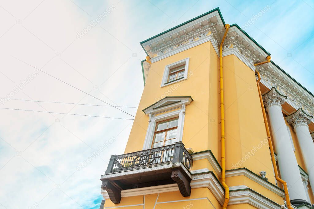  Facade of the historic yellow building in St. Petersburg