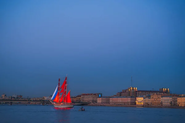 The Scarlet Sails Alumni Festival. The ship goes along the Neva River. Saint Petersburg, Russia - 24 June 2021