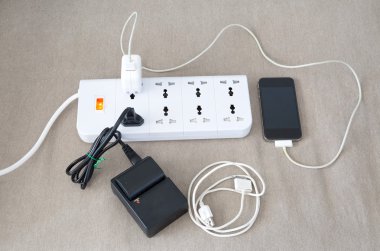Power cord with several adapters and chargers