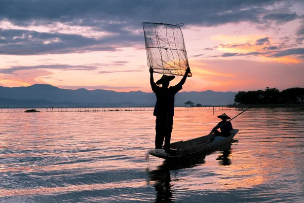 Pêcheurs dans le lac Image En Vente