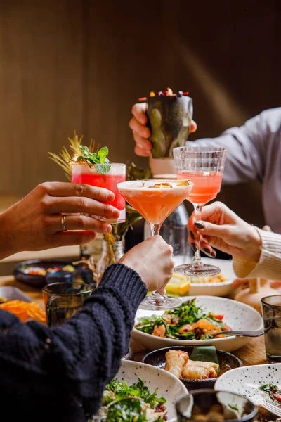 Cropped Shot People Clinking Glasses Having Dinner Table Restaurant Royalty Free Stock Images