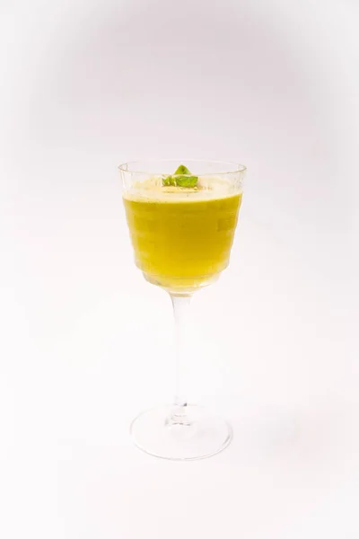 a fresh citrus cocktail on white background
