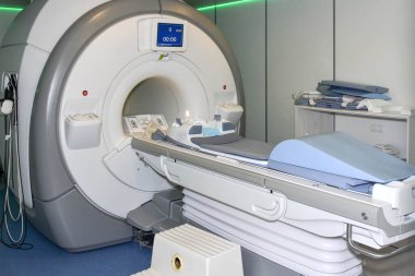 magnetic resonance imaging and examination of patients on it  clipart