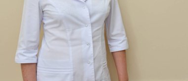 doctor or nurse in a white medical coat 