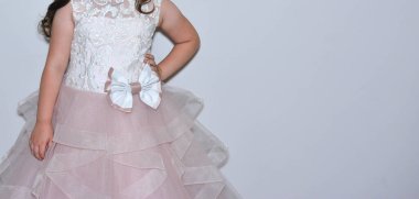 woman in an elegant dress made of thin or transparent fabric 