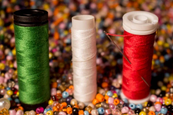 Green White Red Threads Together Red Spool Has Needle All — Stock Photo, Image