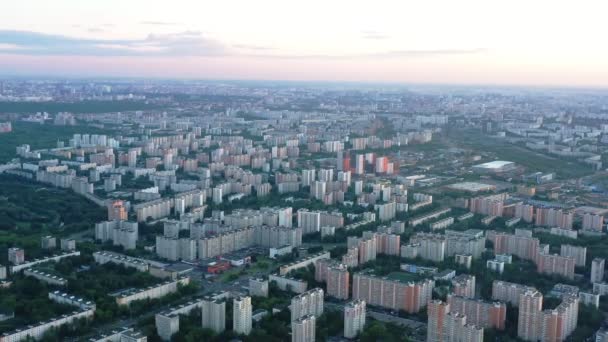 A view from a great height of the sleeping area of Moscow at sunset or dawn — Stock Video