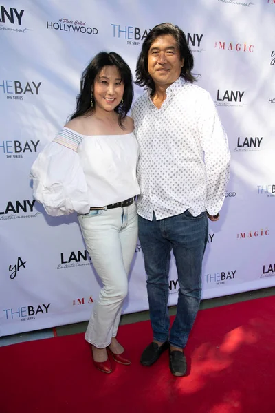 Michelle Kim ve John Kim, 12 Haziran 2021 'de Los Angeles, Kaliforniya' da bulunan özel konutta LANY Entertainment yaz etkinliğine katıldılar.