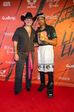 Reality TV Yıldızı Justin Hinsley, CEO Jaylyn Handley 31 Ekim 2025 'te Los Angeles, CA' da McKenzi Brooke 'un Yalancı Cadılar Bayramı partisine katıldı.