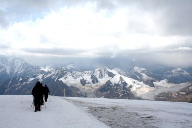Travel on Mount Elbrus slope clipart