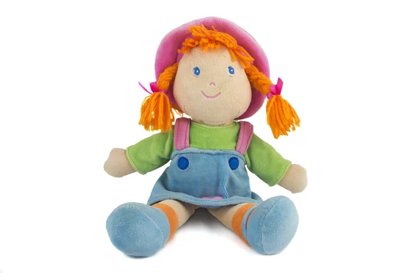 Stuffed soft sitting funny pig-tailed red-headed doll isolated o — Stock Photo, Image