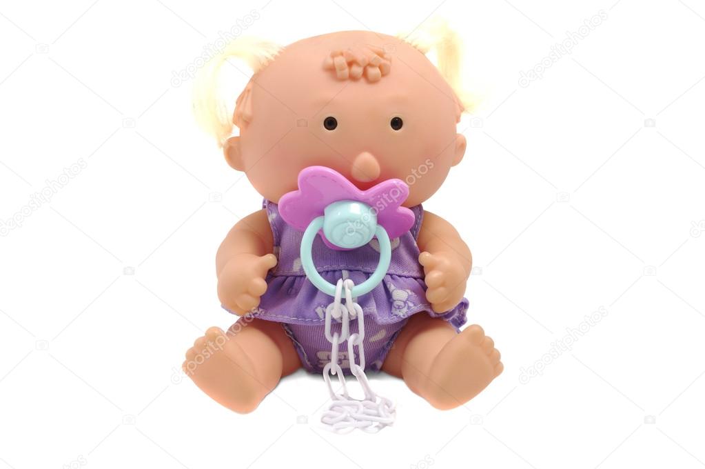 funny baby doll with dummy isolated over white